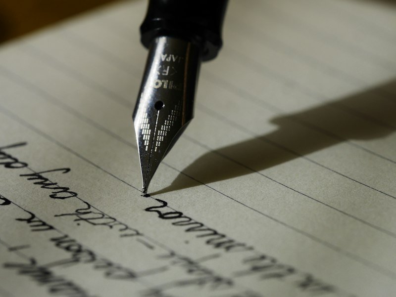 Federal retirement planning notebook, glasses, pen, and structured roadmap